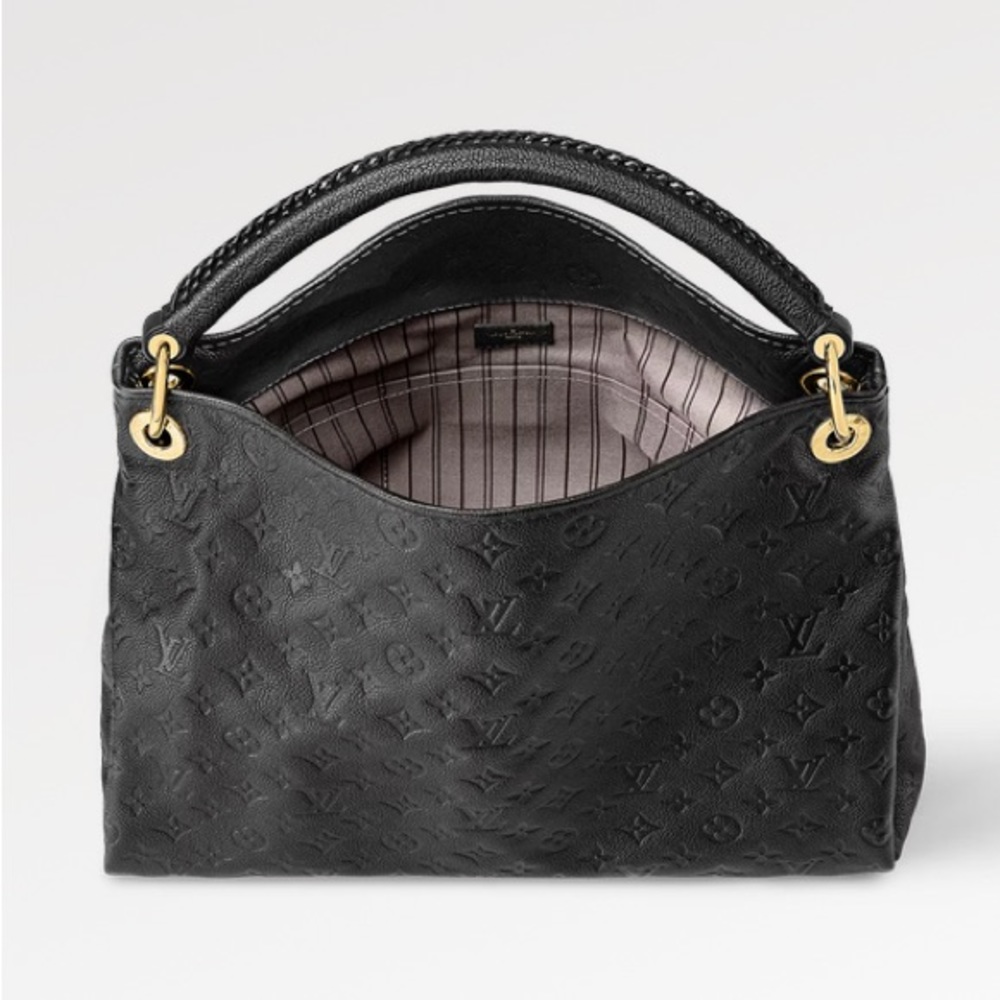This is an authentic LOUIS VUITTON Empreinte Artsy MM in Black.